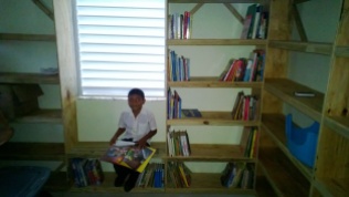 Ivan is the first Heart House kid to enjoy the new library.