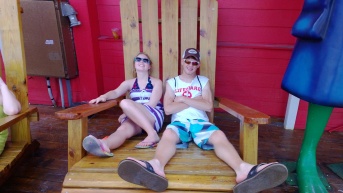 My kids in an oversize chair in Freeport outside of Senor Frogs