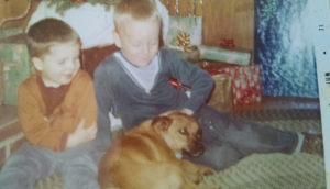 This is a photo from Christmas 1970 of my brother on the left. me and Snoopy. 